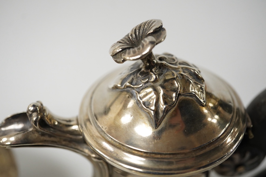 A small French white metal hot water pot, 13cm, a continental white metal bowl (a.f.) and a 19th century German white metal spoon. Condition - poor to fair